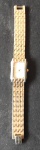 Relógio Feminino Mondaine, pulseira em aço mesclado com dourado, não se encontra funcionando, no estado.