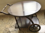 AM007, Antigo carrinho de chá (mesa dobrável). medindo 70 cm de altura x 77 cm de diâmetro. No estado.