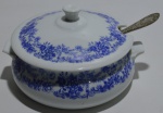 Farofeira de louça com colher (pequeno lascado)