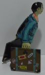 Brinquedo em lata a corda 15 cm