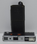 Máquina Minolta Autopak 450 E no estado, com capa corino