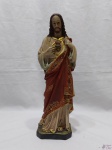 Escultura imagem de Jesus com sagrado coração em gesso com policromia. Medindo 32cm de altura.