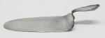 WMF - Espátula da manufatura WMF (Wuerttembergische Metallwarenfabrik), em metal espessurado a prata. Alemanha, séc. XX. Med. 3x17 cm.