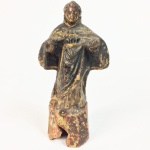 Imagem em terracota policromada representando Santo Agostinho. Brasil, Séc. XIX. 19 cm de altura.