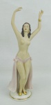 A. Steiner - Escultura Art-deco, de coleção, em porcelana policromada, representando "Dançarina". Assinada na base. Alt. 24 cm.