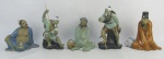 Cinco estatuetas em porcelana oriental policromada, representando diversas figuras. Alt. maior e menor 16,5 cm e 12 cm.