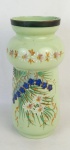 Vaso em opalina europeia, na tonalidade verde. Decorado com pintura esmaltada de flores e arabescos em policromia. Alt. 26,5cm.