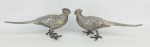 Par de esculturas em prata cinzelada, representando "Casal de pássaros". Med. 10x23x7,5cm. Peso 850g.