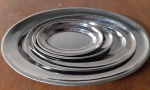Quatro travessas em inox - Medidas: 39x26 cm ,29x19 cm , 22x14 cm  e 18x07 cm