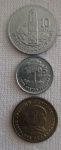 Três medas, dez centavos Monolito de Quirigua 1991 Rep. Guatemala , cinco  centavos 1992 e um centavos 1991 .