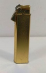 Antigo isqueiro STARLON e, metal dourado JONY . Mede: 7 cm 