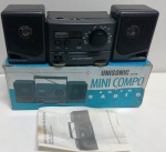 MINI RÁDIO PORTÁTIL UNISONIC - AM FM - NÃO TESTADO - NO ESTADO