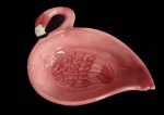 Petisqueira em porcelana no formato de flamingo. Medida 13x14cm.