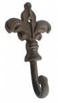 Cabideiro de um gancho em ferro fundido para fixação na parede na forma de flor de liz.