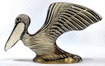 PALATNIK  Escultura cinética representando pelicano em resina de poliéster de manufatura Abraham Palatnik. Medindo 16 cm de altura por 28 cm de comprimento.