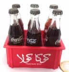 Colecionável conjunto de garrafas promocionais da Coca-cola em miniatura, maior comprimento 8 cm.