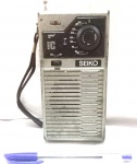 Rádio de pilha de origem japonesa, da marca Seiko, maior comprimento 15,5cm, marcas do tempo, não testado.