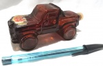 Antigo vidro de perfume da Avon `Tai Winds`, representando carro, maior comprimento 13cm.