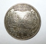 Moeda brasileira, produzida em prata, de 2000 Réis, comemorativa do 1º centenário da Independência do Brasil.