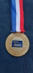 MEMORABILIA ESPORTIVA - XIV JOGOS PANAMERICANOS - SANTO DOMINGO - 2003 - Medalha de Ouro (met mm MUITO RARA. NÃO OFERECIDA À VENDA NO MERCADOal dourado). Com fita ORIGINAL - discretas marcas do tempo - no estado . Diâmetro 70