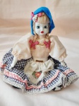 Graciosa boneca. Rosto, pernas e mãos de biscuit. Altura 23,5 cm