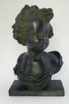 Escultura representando busto de criança em resina negra, med.34x20x16 centímetros.