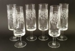 Seis taças em cristal, estas com bojos decorados com parreiras, med. 17 centímetros.