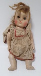 Antiga boneca em porcelana com olhos articulados,  med. 30 centímetros.