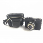 COLECIONISMO - Câmera fotográfica BEIRETTE, modelo VSN. Lente Meritar 2.4 / 45. Acompanha capa de couro. No estado. Sem teste de funcionamento.