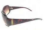 Óculos de sol da CALVIN KLEIN marrom. Em bom estado. Lente apresenta marcas de uso. 
