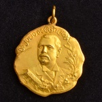 Medalha Comemorativa, Morte de Julio de Castilhos - Glória do Rio Grande do Sul, com Olhal, Data 1903, Bronze Prateado, Peso 12 g, Diâmetro 31 mm, Muito Bem Conservada.