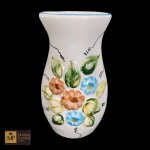 ANTIGA FLOREIRA EM FAIANÇA COM DECORAÇÃO FLORAL EM ALTO RELEVOE POLICROMIA, BORDA COM FRISO AZUL - MED: 20 X 12,5CM.