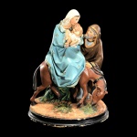 ARTE SACRA - ANTIGO GRUPO ESCULTÓRICO EM ESTUQUE,REPRESENTANDO JOSÉ,MARIA EMENINO JESUS EM FUGA - MED: 27 X 32 X 12 CM. APRESENTA PERDAS.