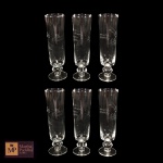 SEIS FLUTES EM VIDRO COM LAPIDAÇÃO FITOMÓRFICA - MED:15,5 CM - APRESENTAM DEFEITOS DE FABRICAÇÃO. 
