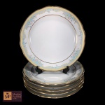 SEIS  PRATOS PARA CHÁ EM PORCELANA BRANCA COM RESPECTIVOS PIRES,DECORAÇÃO FLORAL SOBRE FUNDO AZUL-CLARO E FAIXAS EM AMARELO E DOURADO DA MANUFATURA GERMER