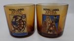 Dois copos whisky royal label de signos em vidro amarelo, Escorpião e Virgem.