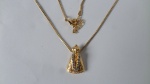 Gargantilha em metal dourado com pingente anexo de N. Sra. Aparecida com pedras de zircônias. 45 cm.