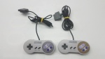 2 Controles Manetes Para Videogame Console Super Nintendo - SNES Originais , Funcionando, porém um está com os botões Start e Select para revisar e outro está com o R2 ruim.Indicamos a retirada do item diretamente em nossa loja.Caso seja solicitado o envio por correios ou transportadora,não nos responsabilizamos caso o item ao chegar não funcione.