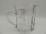 Xícara / Caneca da Nescafé medindo 8cm de altura, incolor, sem uso, com etiqueta original da Nadir, com a palavra Nescafé em alto relevo.