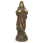 DOMINIQUE ALONSO (França, XIX/XX) - Imagem criselefantina em bronze polido e possivelmente marfim, representando Sagrado Coração de Jesus, apoiado em base semiesférica com borda facetada lisa. Assinada. 28 cm. Falta a base.