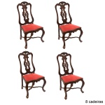 Conjunto de 8 cadeiras para sala de jantar, estilo D. José em madeira nobre, esculpidas e ornamentadas por frisos, folhagens e volutas. Encostos abaulados com cachaços vazados e encimados por composições florais. Tabelas construídas com hastes onduladas centralizando adornos geométricos. Assentos com laterais e frentes arqueadas. Pernas dianteiras curvilíneas realçadas por joelhos salientes e rematadas por pés recurvos. Bases reforçadas por traves com amarração em X. Forração em veludo vermelho. 107 x 59 x 46 cm. Apresenta sinais de uso com pequenos bicados.