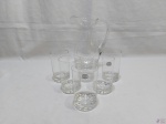 Jogo de 6 copos e jarra em cristal Blumenau, 2 peças seladas. Medindo a jarra 23cm de altura.