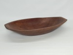 DIVERSOS, uma (1) gamela entalhada em madeira maciça, medindo 42,5 x 23 x 7 cm.