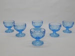 VIDRO, seis (6) taças de pé baixo para sobremesa, tonalidade azul, translúcidas, moldadas em gomos, marca de origem Indonésia relevada na própria modelagem, medindo 8 cm altura e diâmetro.