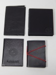 DIVERSOS, quatro (4) itens: 1 porta blocos da COURO E PAPEL; 1 porta passaporte em couro brinde da Touristcard; 1 porta documentos da Autokraft brinde da BMW; 1 porta cartões em plástico; todos sem uso, na tonalidade preta, medindo o maior 11 x 11 cm.