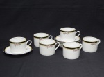 PORCELANA, seis (6) xícaras para chá, ornadas com faixa na tonalidade preta e singelos detalhes florais policromados, manufatura REAL (Mauá, SP, 1943 a 1994).