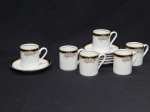 PORCELANA, seis (6) xícaras para café, ornadas com faixa na tonalidade preta e singelos detalhes florais policromados, manufatura REAL (Mauá, SP, 1943 a 1994).