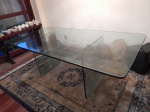 Mesa para sala de jantar, tampo e base em grosso cristal belga, guarnições de metal prateado. Década de 1970. 82 x 212 x 106cm. Retirada em casa na Barra da Tijuca por conta e risco do arrematante, com agendamento.