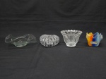CRISTAL E VIDRO, quatro (4) itens: 1 vaso pequeno, multicolorido, tipo cachepô com a borda drapeada, label da marca DANVIN DEVITRO, medindo 7 x 7 x 6 cm; três outros incolores e translúcidos, sendo: 1 fruteira pequena, formato irregular, label da VITRO HOUSE CRISTALLERIE, modelo ecológico, medindo 14 cm diâmetro; 1 caixa com tampa no formato de coração, moldada em caneluras, medindo 10 x 8,5 x 4,5 cm; 1 taça para sobremesa, moldada em flores, borda recortada, fundo em dália, marca de origem Indonésia, relevada na própria modelagem, medindo 10,5 cm altura e 7 cm diâmetro.