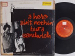 Hubert Laws Group  A Hero Ain't Nothin' But A Sandwich LP 1978 IMPORT Trilha sonora Soul Funk. LP Original americano Gravadora CBS 70's. Capa em medio estado. Com desgastes, etiquetas de Radio, manchas e marca de caneta. Disco em bom estado com riscos superficiais e etiquetas de radio em ambos os rótulos.